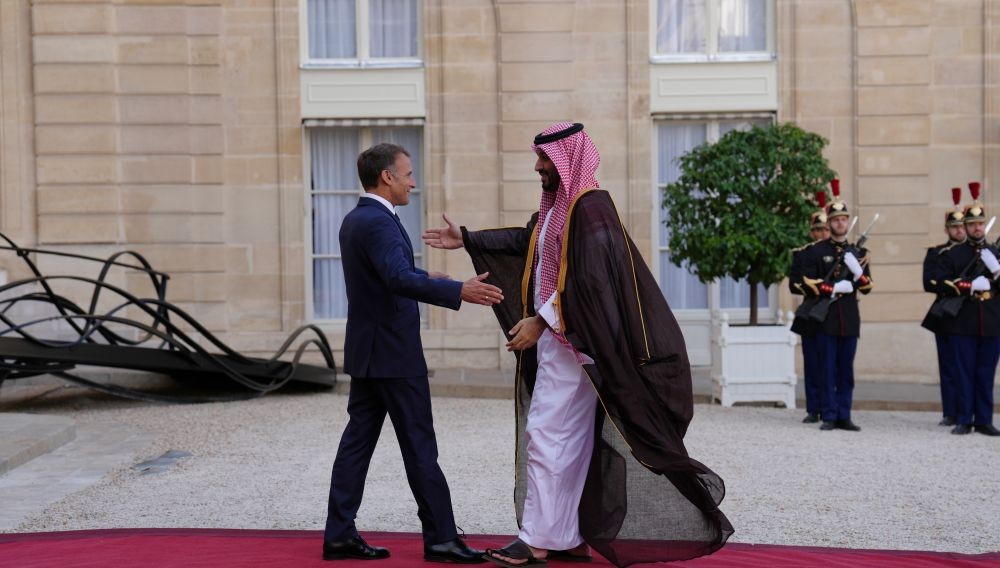 Emmanuel Macron greets Crown Prince Mohammed bin Salman, Elysee Palace, Paris, France, Monday, Aug. 24, 2026. (AP Photo)