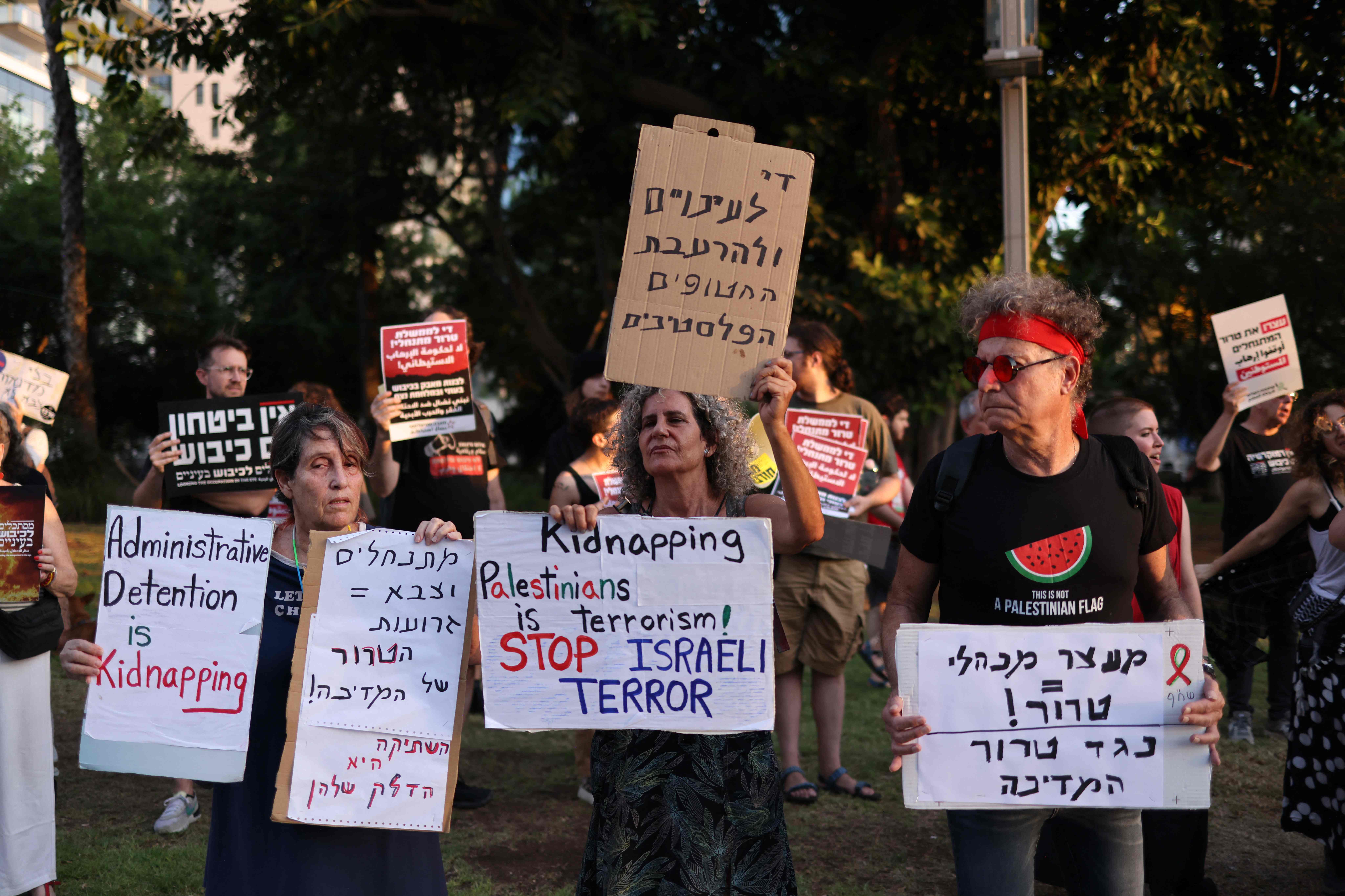 Israeli left-wing activists protest in Tel Aviv on August 1, 2026 against settlers' attacks in the West Bank. (AFP)
