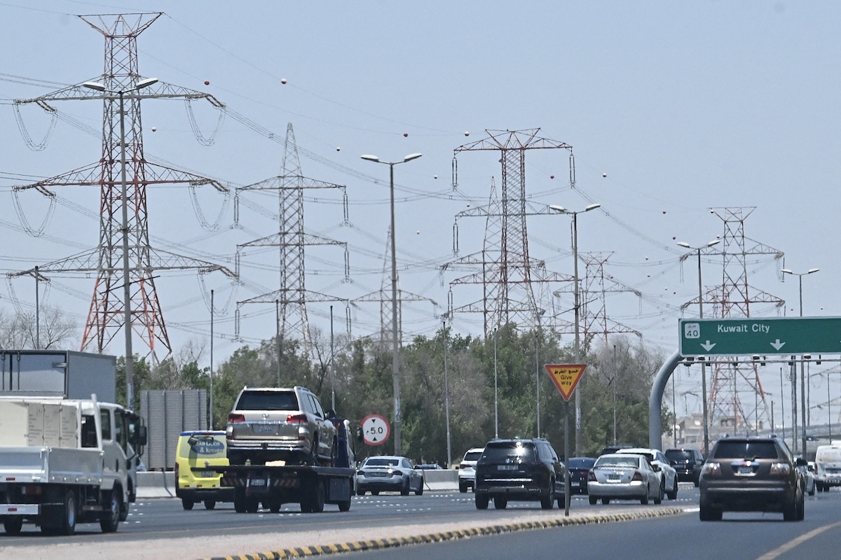 Vehicles drive along a highway on the outskirts of Kuwait City on July 8, 2026. (File/AFP)