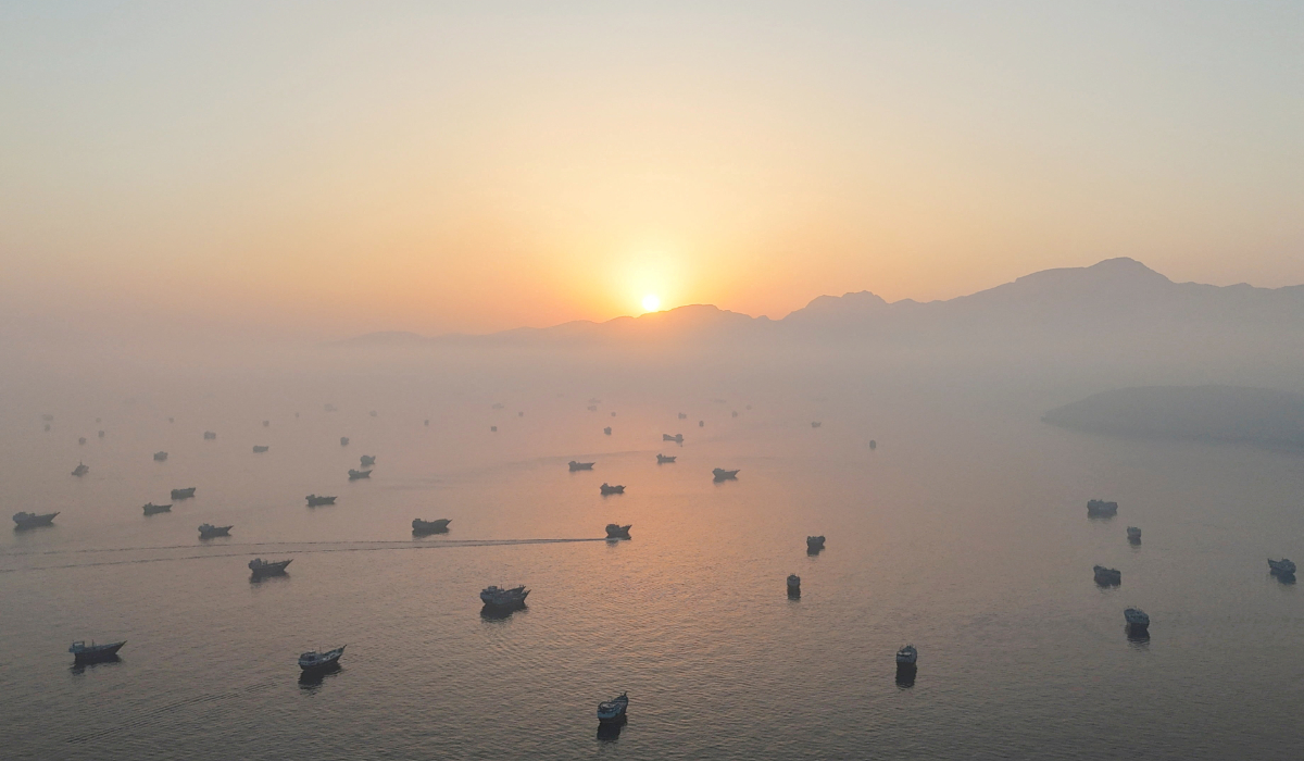 A drone view shows vessels in the Strait of Hormuz, as seen from Musandam, Oman, June 15, 2026. (REUTERS)