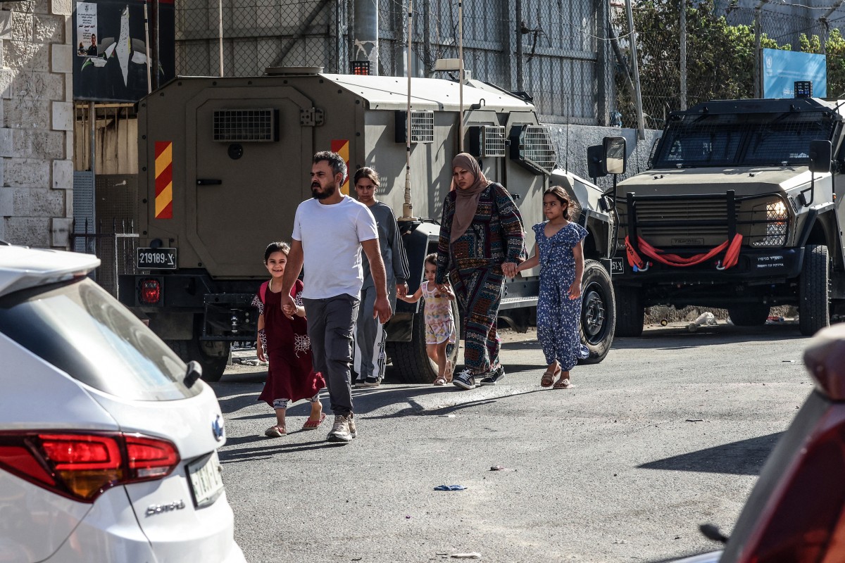Financial crisis unfolds alongside intensified Israeli military operations movement restrictions across the occupied West Bank. (AFP)
