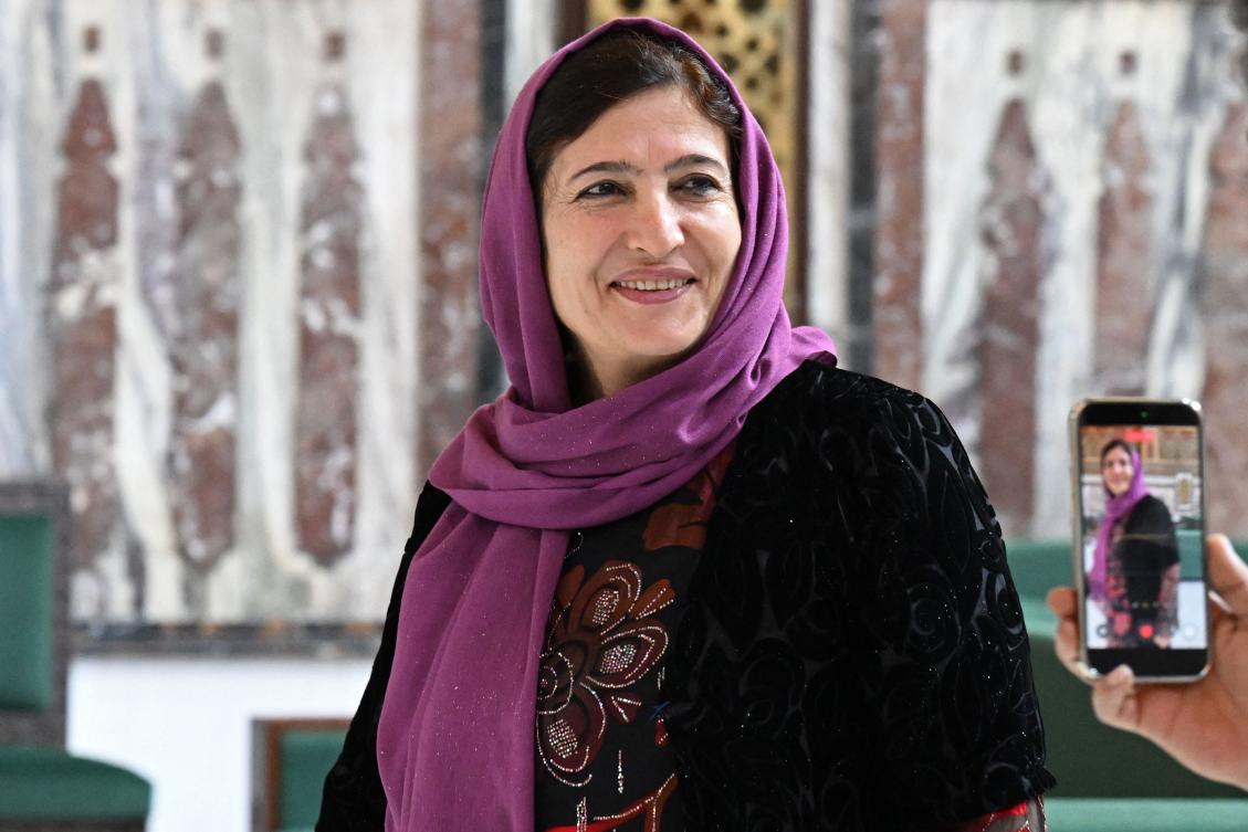 Syria’s member of parliament Fasla Yousef poses inside one of the halls of the parliament in Damascus on Jul. 27, 2026. (AFP)