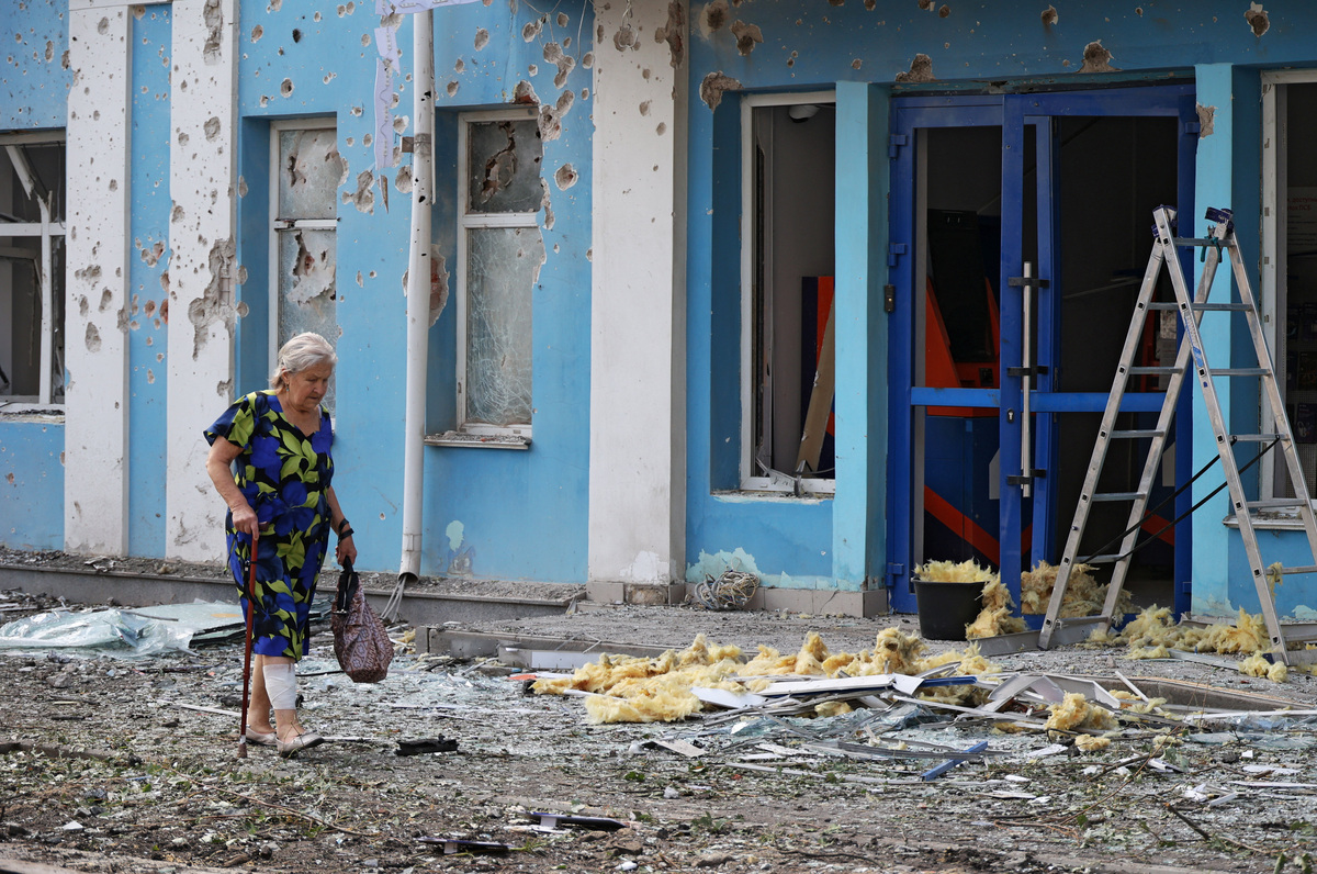 A bank building damaged during a Ukrainian overnight drone attack, according to local authorities, in Belgorod, Russia, August 9, 2026. (Reuters)