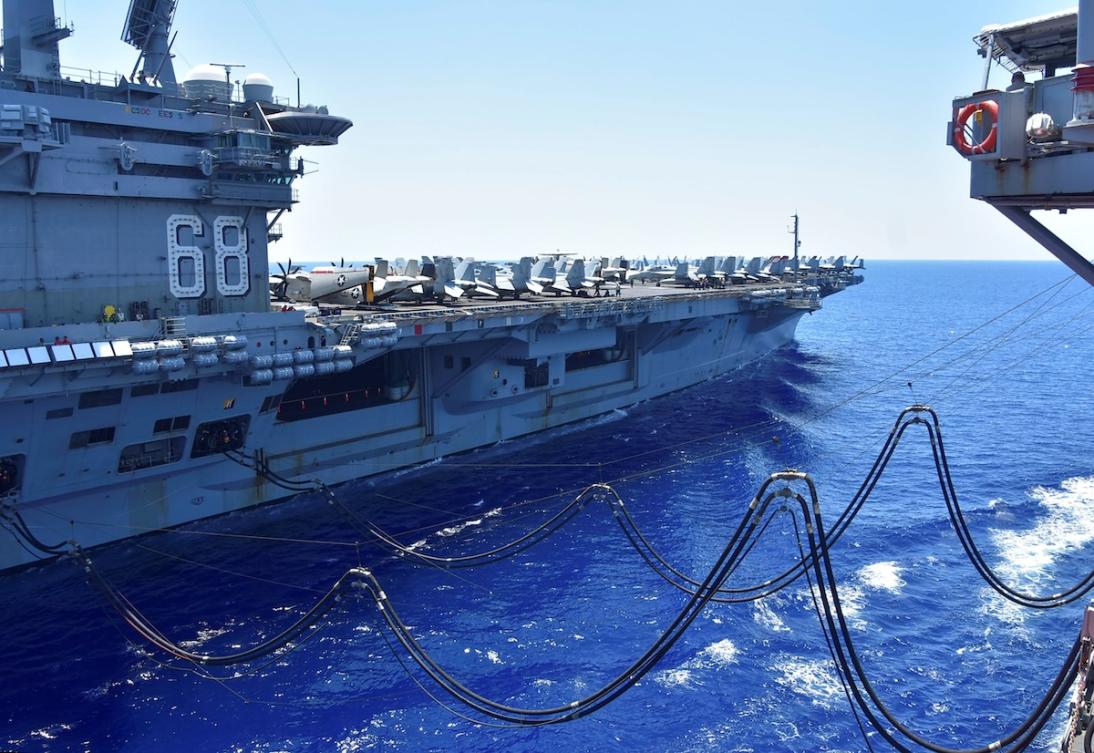 Above, the US Navy aircraft carrier USS Nimitz receives fuel from the USNS Tippecanoe in the South China Sea July 7, 2020. (US Navy via Reuters)