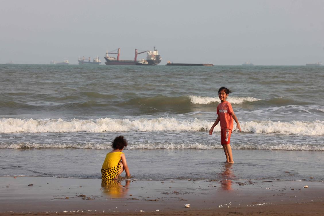 Above, ships are seen in the Strait of Hormuz off Bandar Abbas in southern Iran on Aug. 10, 2026. (AFP)