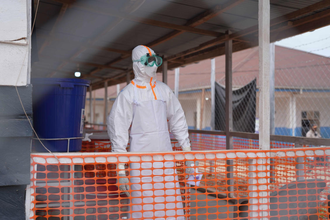 A health worker in protective gear looks on at an Ebola treatment center in Bunia, Congo on Aug. 10, 2026. (AP)