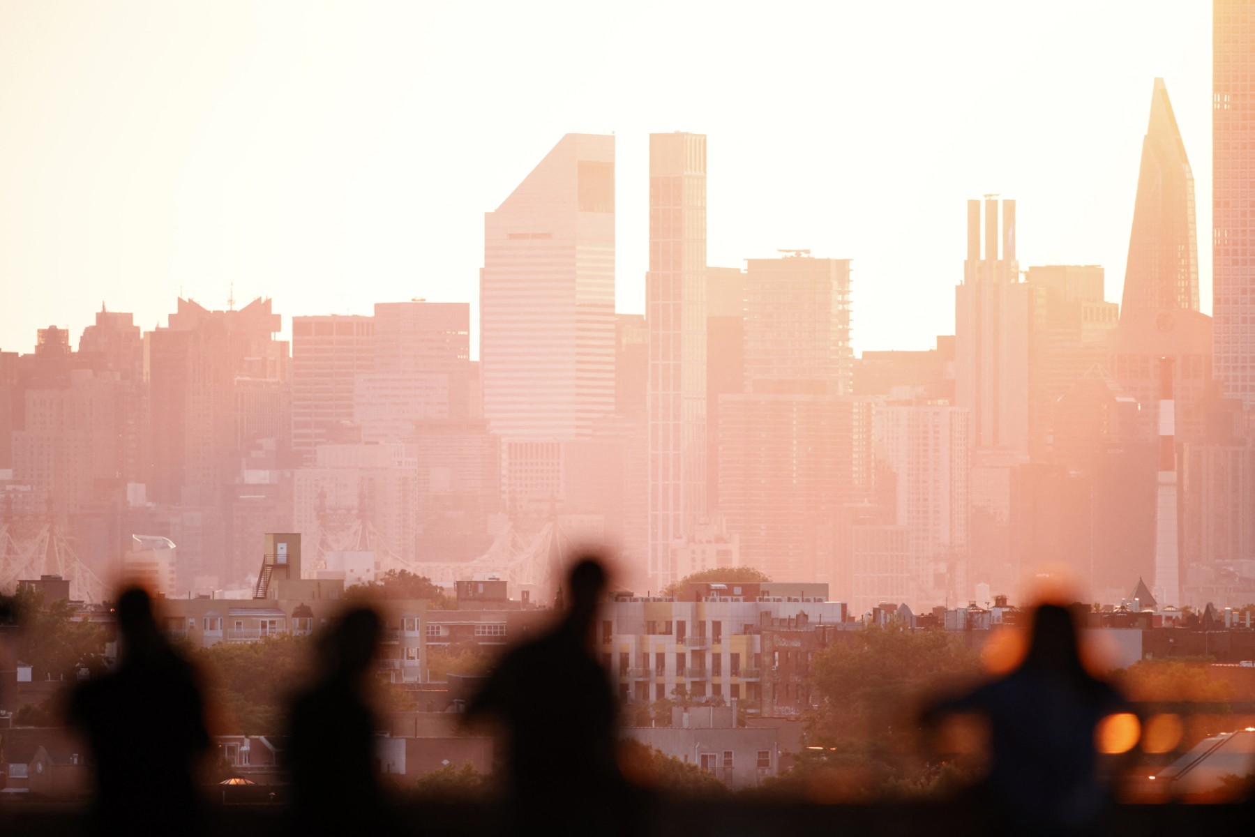 Spectators look at the Manhattan skyline as seen from Arthur Ashe Stadium on day nine of the US Open tennis tournament at the USTA Billie Jean King National Tennis Center in New York City, on September 3, 2024. (AFP)