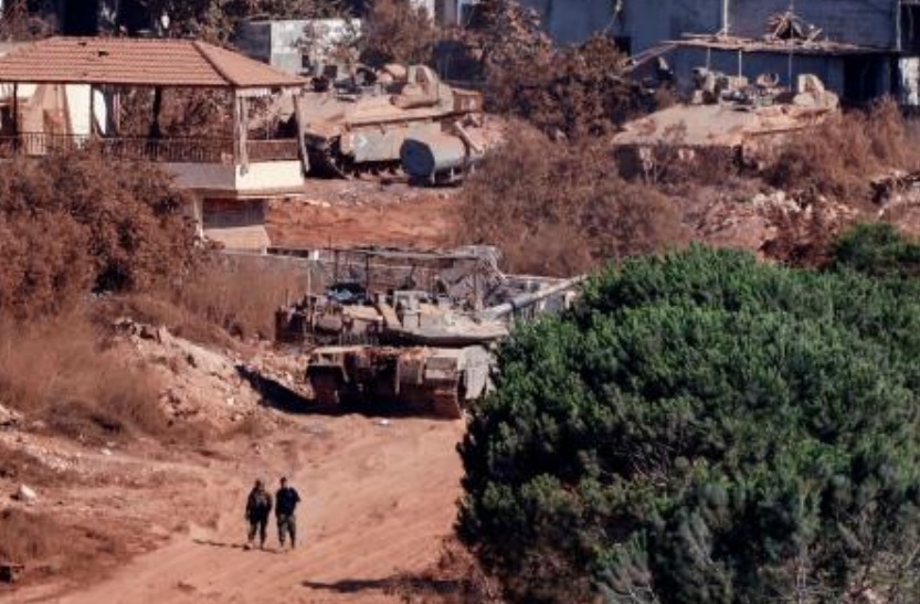 A photograph taken from the southern Lebanese viallage of of Zawtar Al-Gharbiyah shows Israeli troops stationed in the nearby village of Zawtar Al-Charkiyah on August 11, 2026. (AFP)