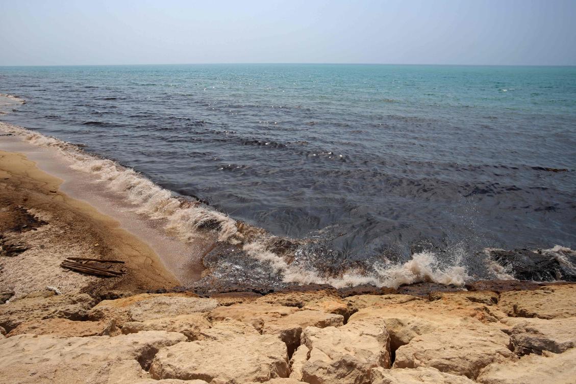 This photograph shows an oil slick along the southern coast of Qeshm Island, Iran. Tankers have been frequently targeted in the Gulf region as the US has exchanged fire with Iran and its allied proxies. (AFP)