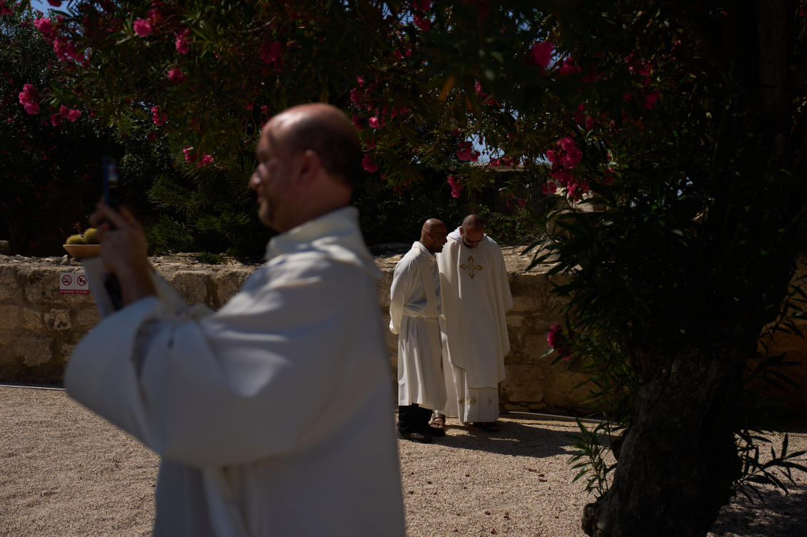 Above, priests gather at the Basilica of the Transfiguration on Mount Tabor, northern Israel on Aug. 6, 2026. Rising interfaith tensions and crime have driven many of Mount Tabor’s Christians to emigrate, several said. (AP)