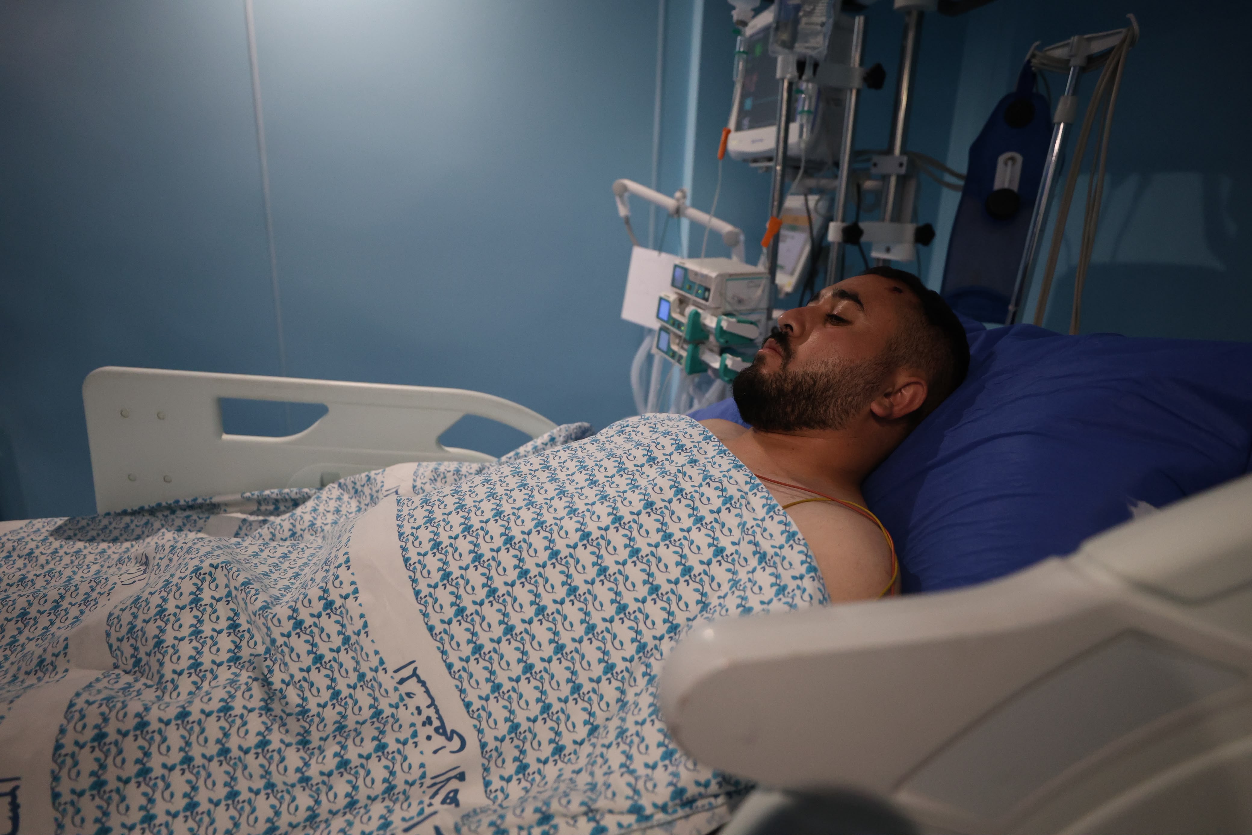 Mohammed Nabil Al-Mutawwar, 27, is being treated at Al-Ahli Hospital in Hebron and requires specialized neurological treatment. (WAFA)