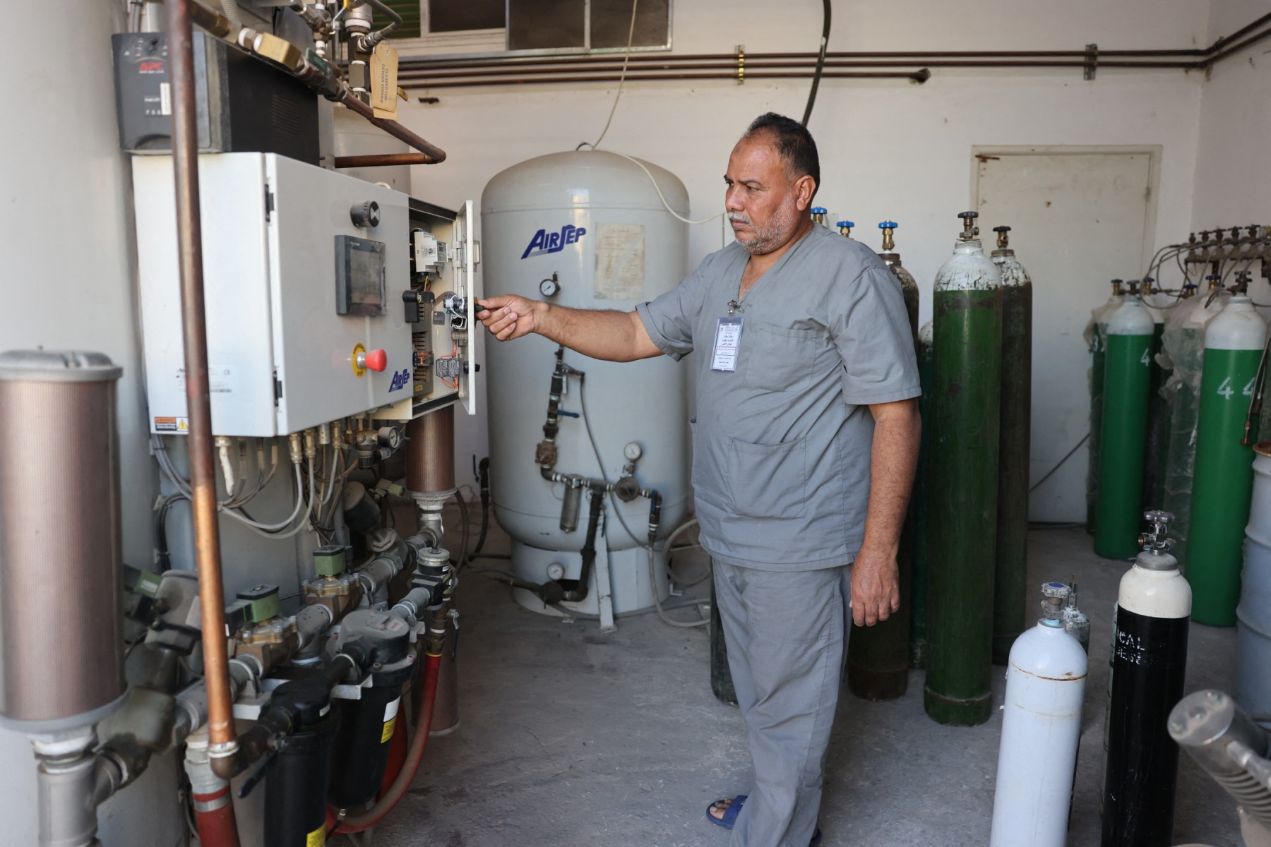Oxygen stations are working under “extremely complex technical and mechanical conditions,” as shortages of spare parts prevent engineers from carrying out essential repairs, the ministry says. (File/AFP)
