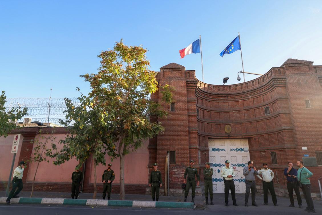 Iranian security forces stand guard in front of the French embassy in Tehran. (File/AFP)