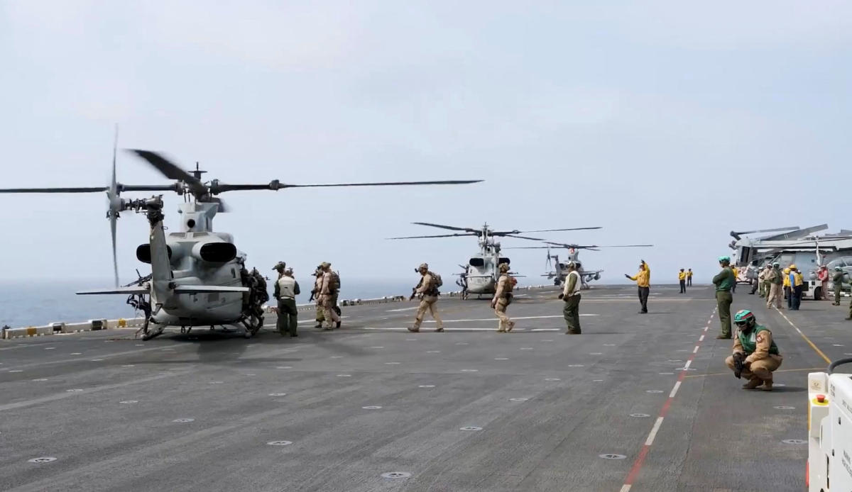US military helicopters and personnel operate in a location given as the Arabian Sea in this screengrab obtained from a video released by US Central Command on July 25, 2026. (US Central Command via Reuters)
