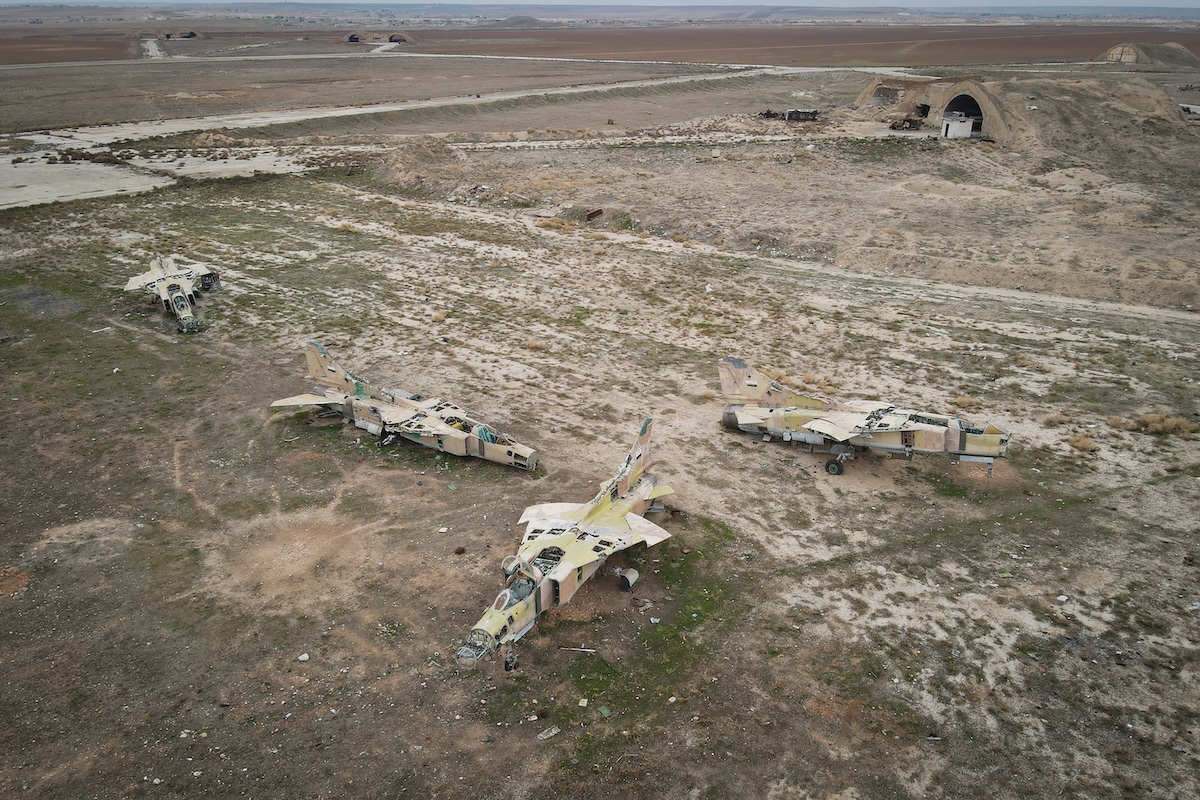 Above, decommissioned Syrian air force planes are seen at the Abu Al-Duhur air base east of Idlib on Dec. 7, 2024. (AP)