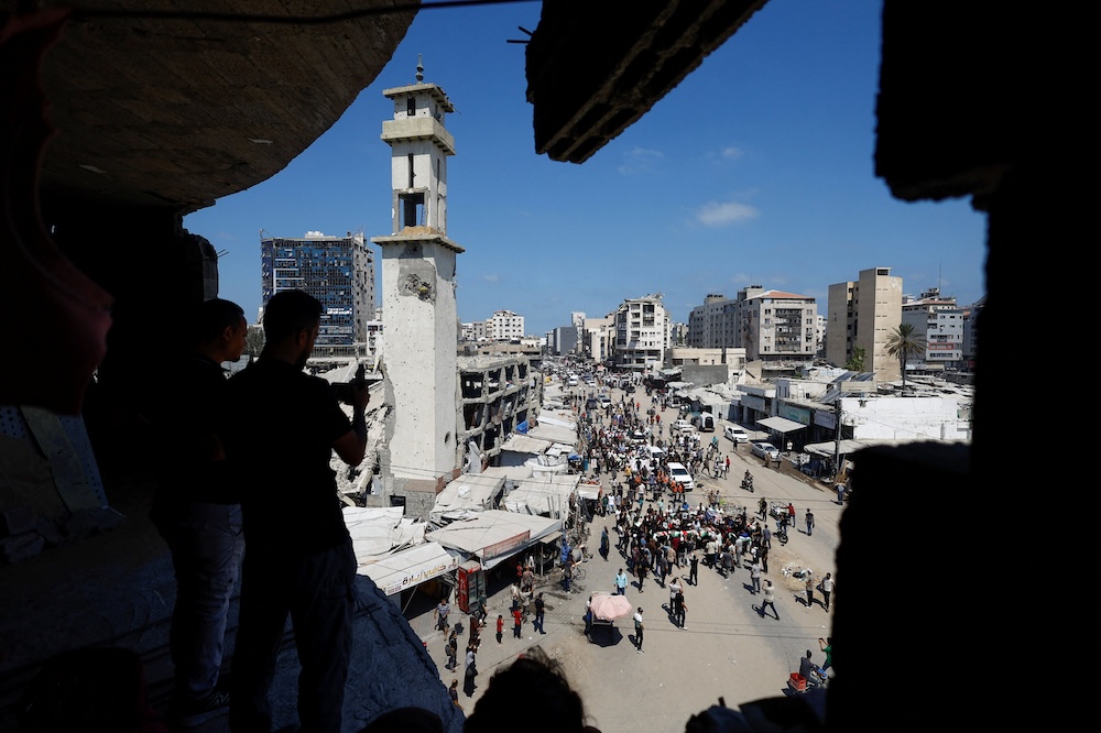 Israel says Gaza reconstruction hinges on Hamas disarmament as regional trio condemns strikes
