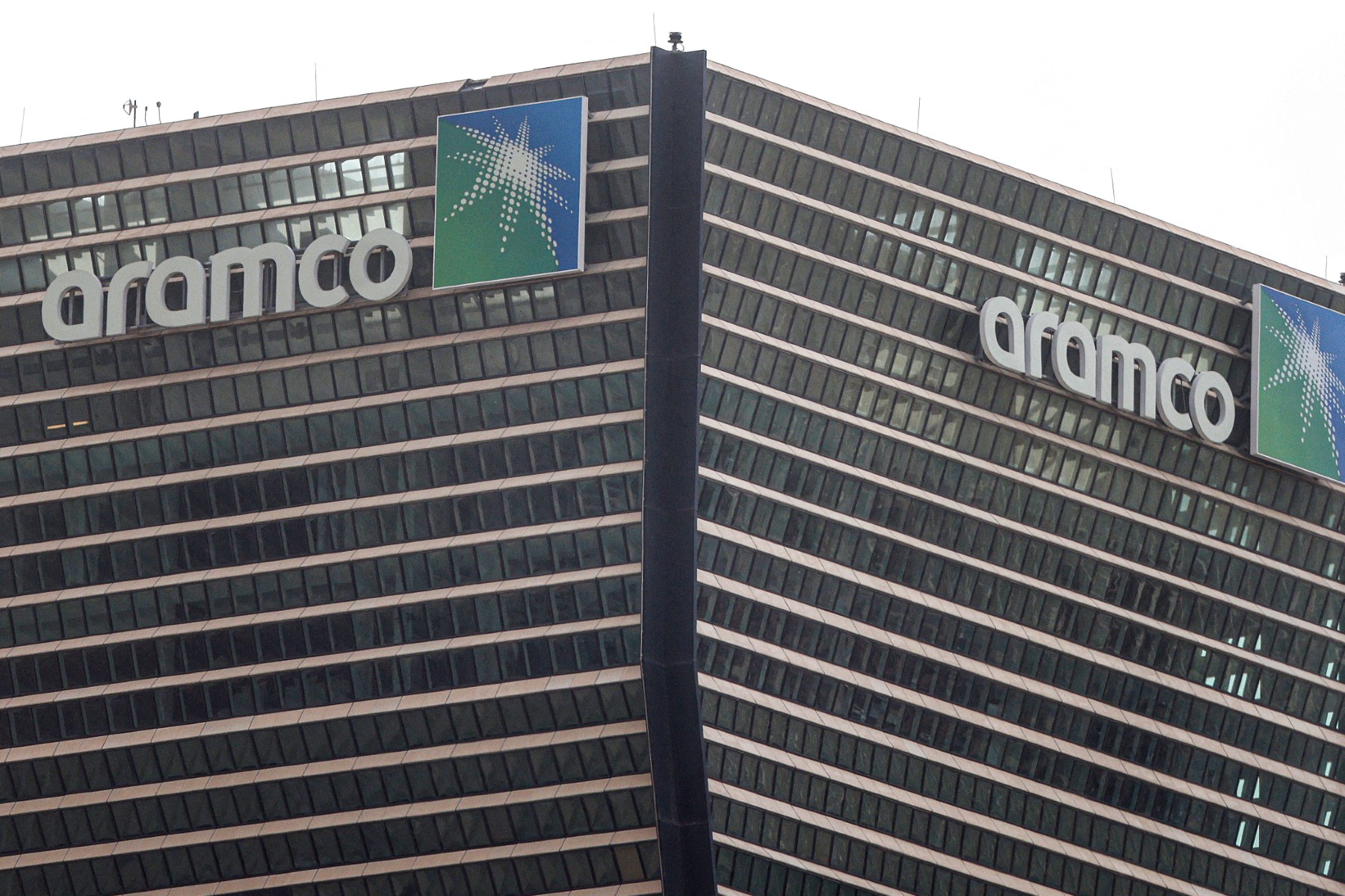A view of the logo on the ARAMCO headquarter, the national Saudi Arabian Oil Company, towers in the King Abdullah Financial District of Riyadh on March 9, 2026. (AFP)