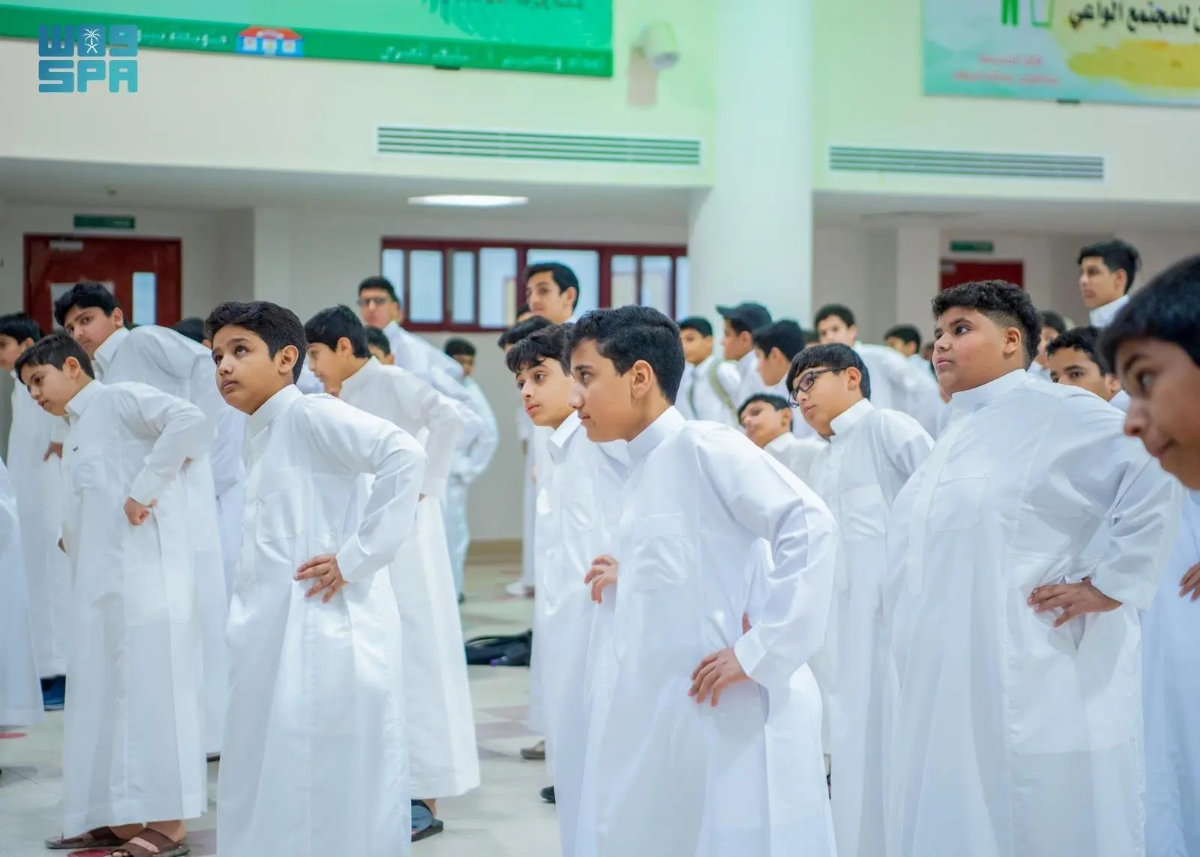 In this file photo, students exercise at the start of their classes as part of a campaign to keep students physically and mentally alert at all times.