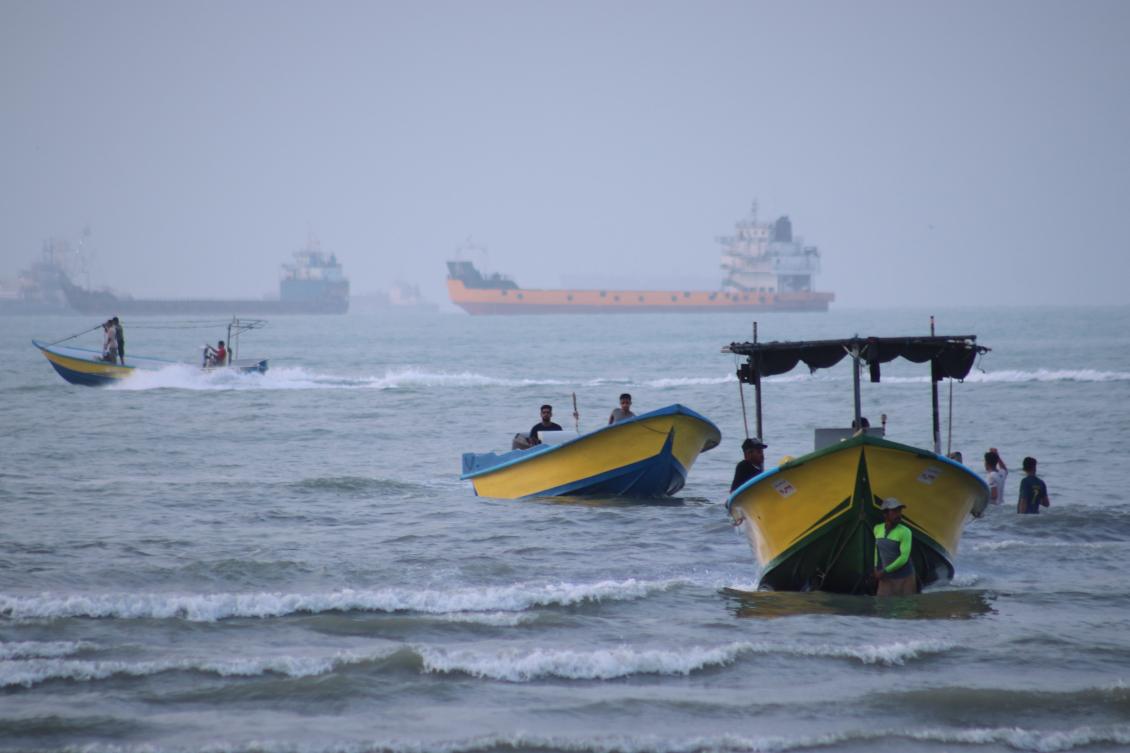 Above, cargo ships and other commercial vessels anchored in the Strait of Hormuz off Bandar Abbas, Iran on July 27, 2026. (ISNA via AP)