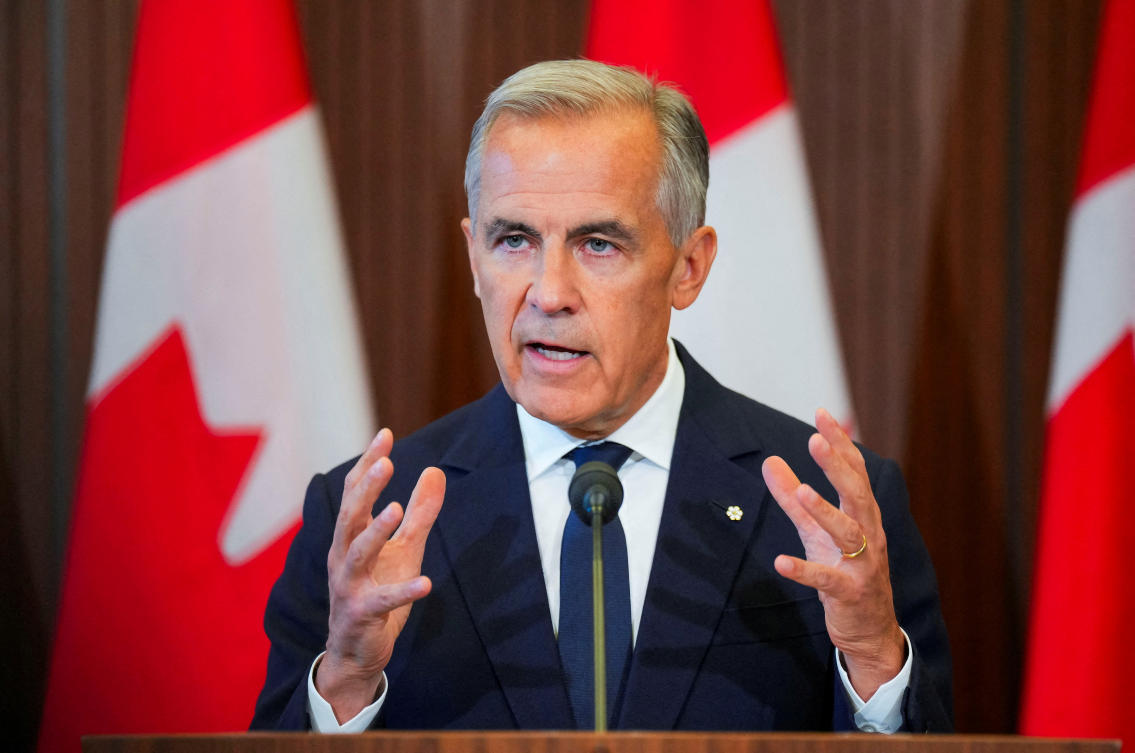Canada’s Prime Minister Mark Carney speaks with the news media after he suspended trade negotiations with the United States, in Ottawa, Ontario, Canada August 22, 2026. REUTERS/Chris Tanouye