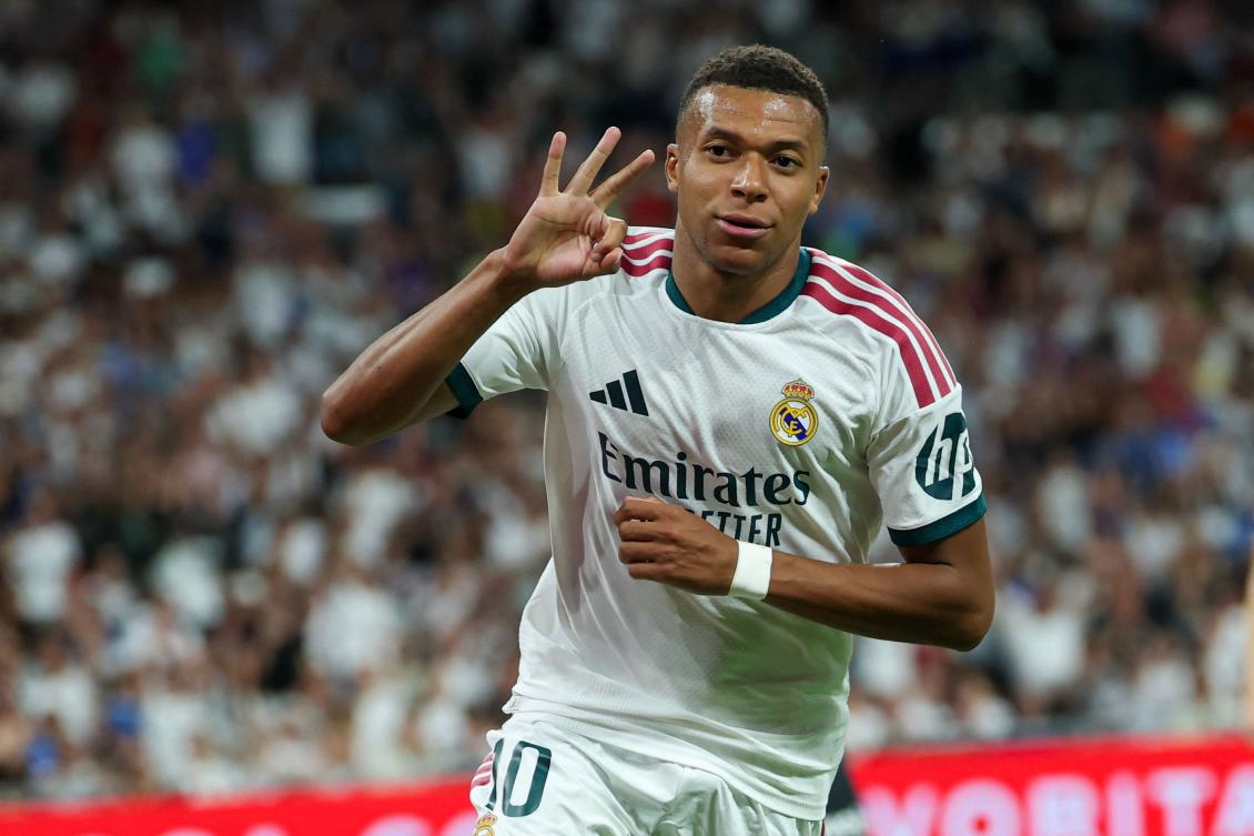 Real Madrid's French forward #10 Kylian Mbappe celebrates scoring a hat-trick and his team's fourth goalduring the Spanish league football match between Real Madrid CF and Real Sociedad at Santiago Bernabeu Stadium in Madrid on August 26, 2026. (AFP)