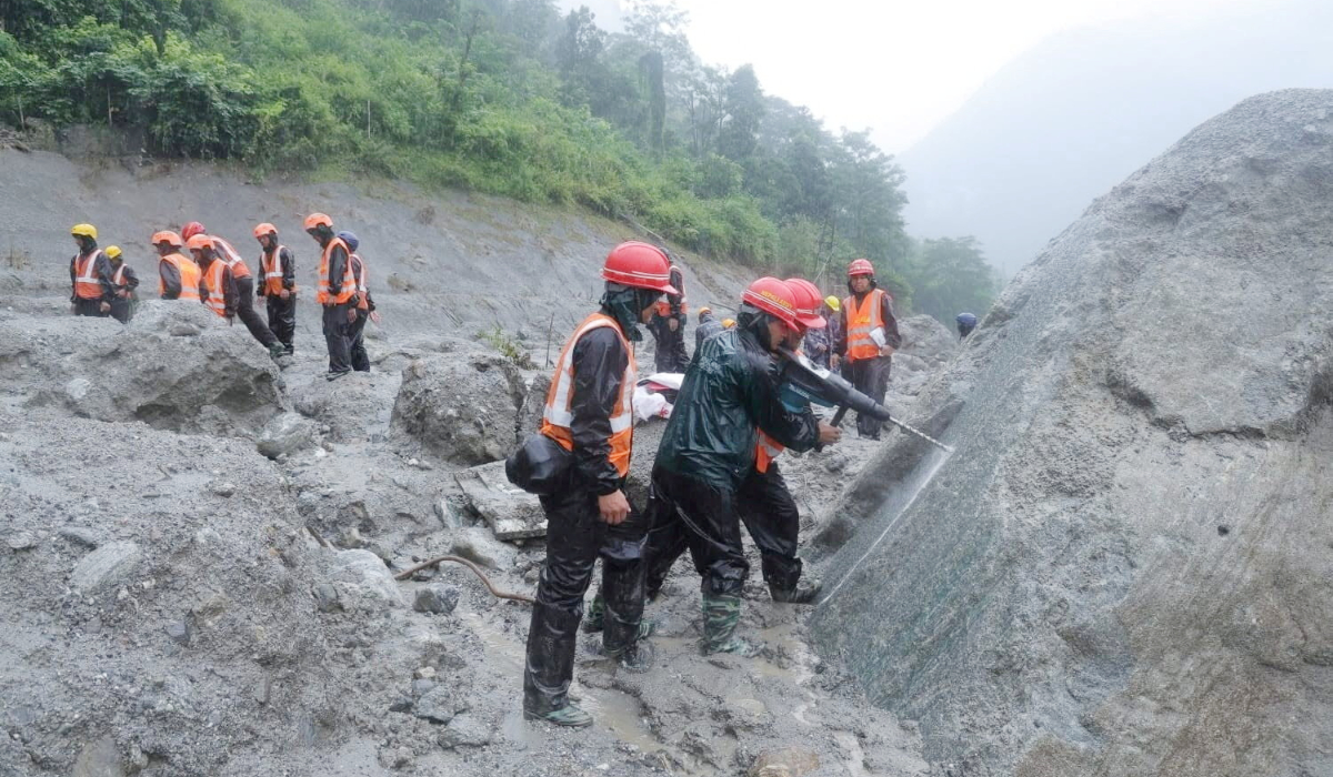 Nepal rescuers drill through debris towards trapped tunnel workers