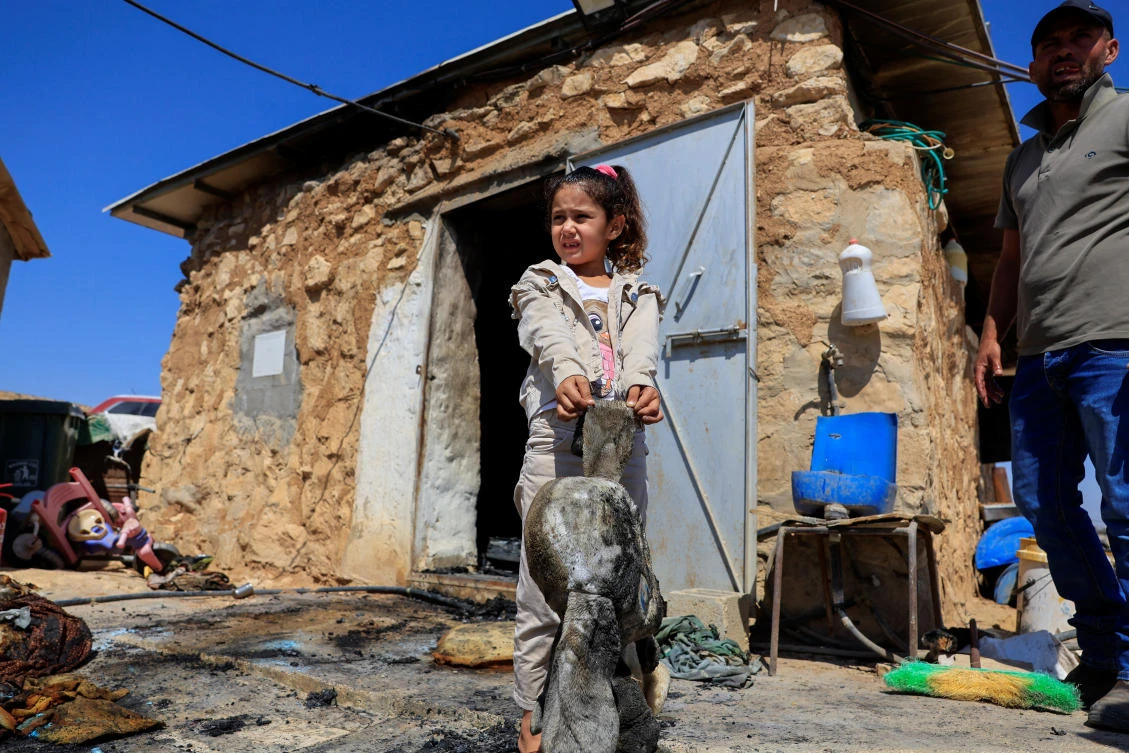 Israeli settlers attack West Bank Palestinian community, burn homes