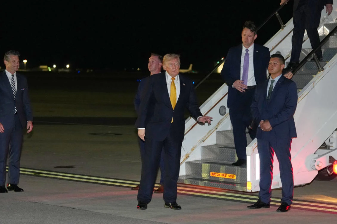 President Donald Trump gestures as he switches planes at US Air Force Base, RAF Mildenhall in Suffolk Eastern England, on his way back to Washington from the NATO summit in Ankara, Turkiye, on July 8, 2026. (AP Photo/Alex Brandon)