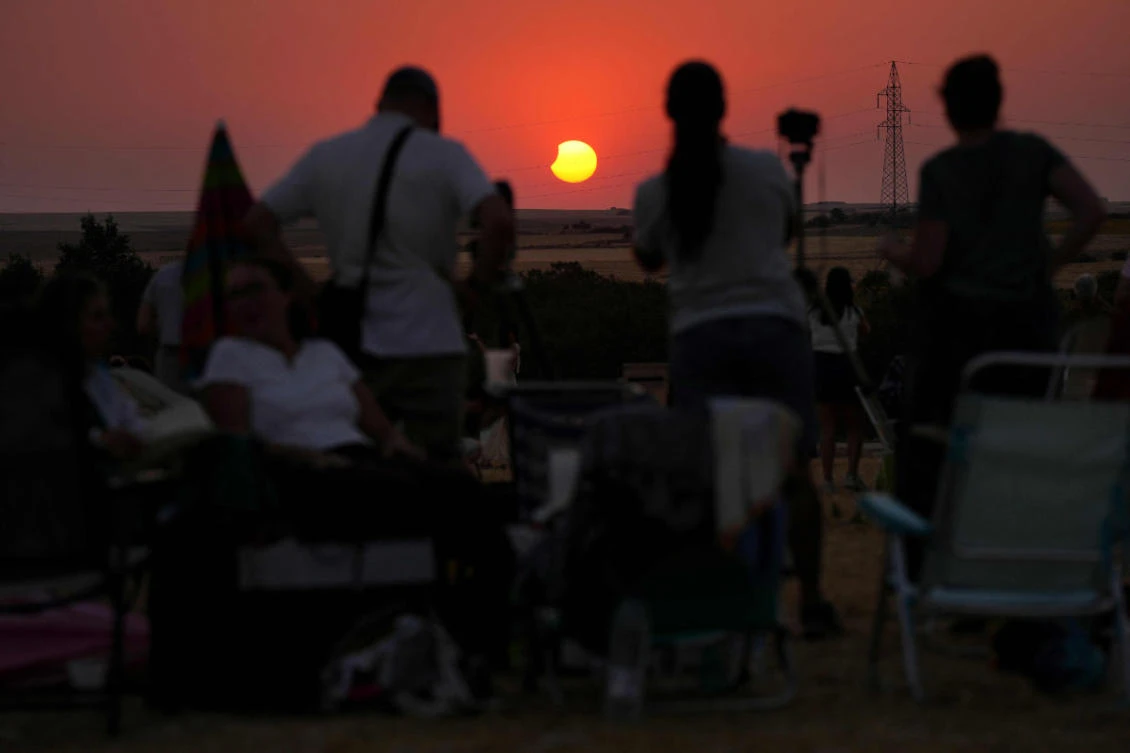 The Moon uncovers the Sun in the moments following totality of the solar eclipse as seen from Lodoso, Burgos province, on August 12, 2026. (AFP)