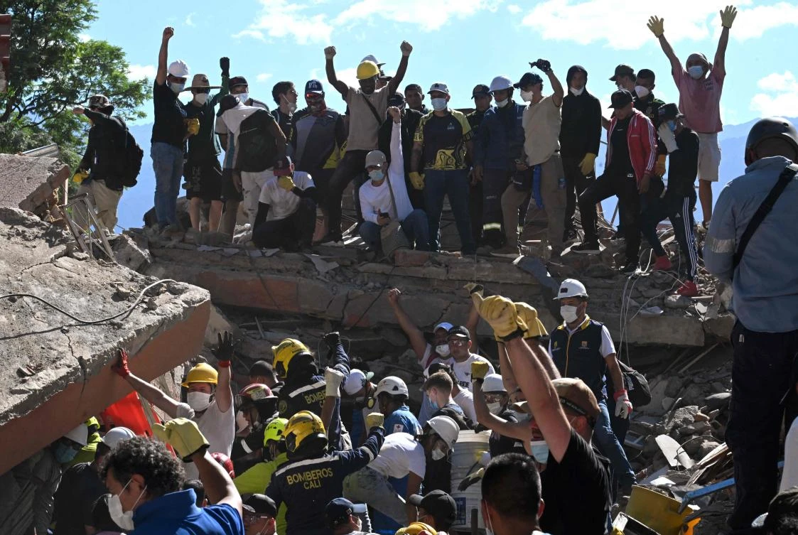 Rescuers call for silence around earthquake rubble as window for survival narrows in Colombia