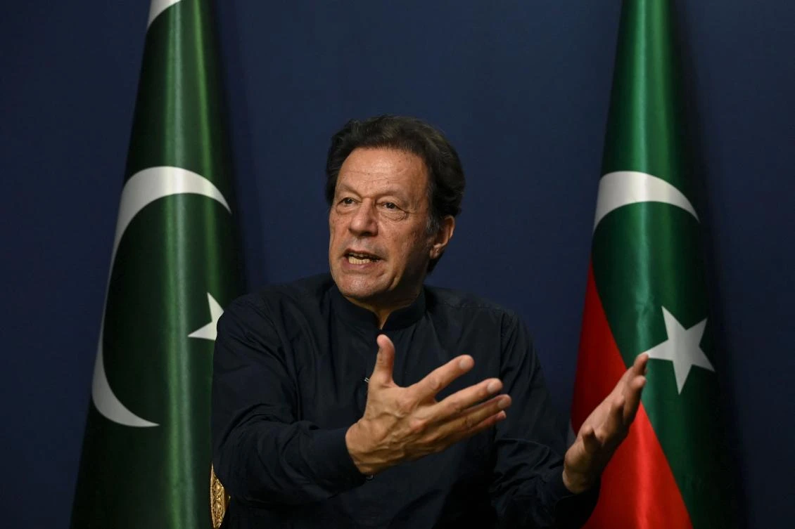 Former Pakistan's prime minister Imran Khan gestures as he speaks during an interview with AFP at his residence in Lahore on May 18, 2023. Pakistan's Supreme Court on August 18, 2026, has ordered jailed former prime minister Imran Khan to be moved to hospital for medical checks, after a petition by his lawyers over claims of poor health. (Photo by Arif ALI / AFP)