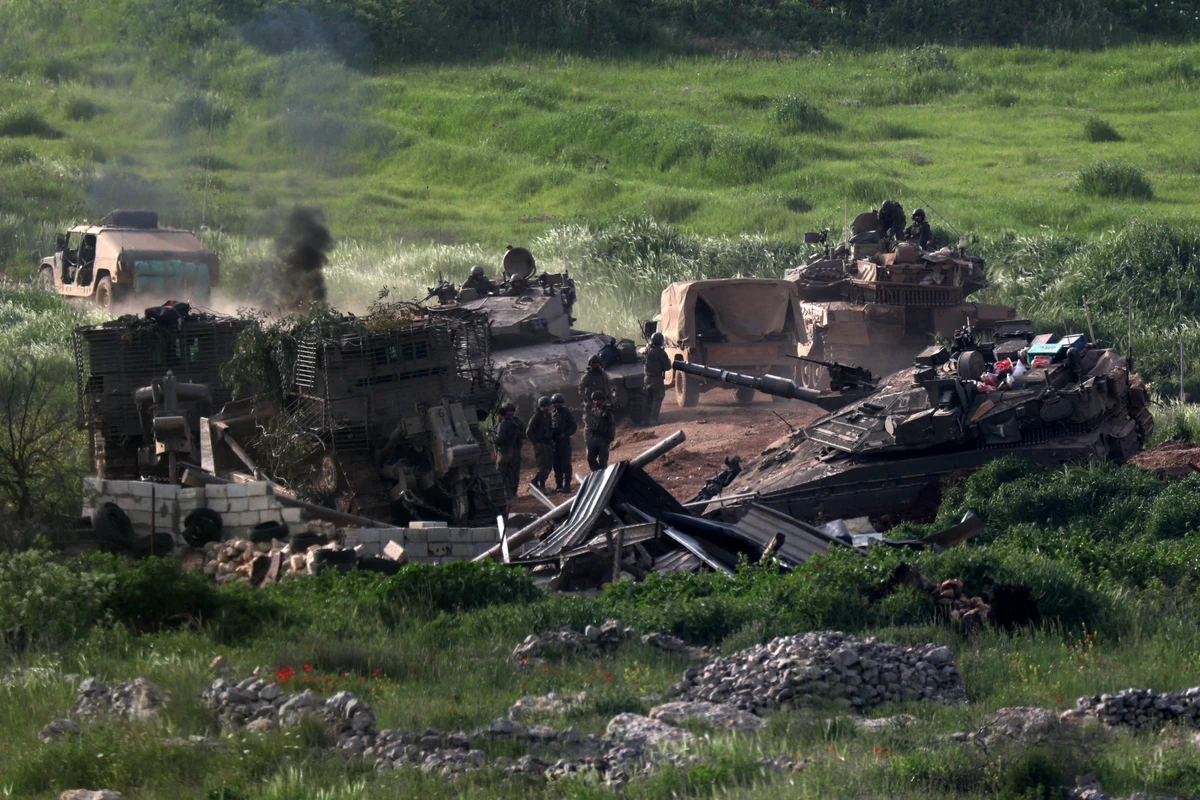 Israeli tanks operate in Lebanon, near the Israel-Lebanon border, as seen from the Israeli side of the border in northern Israel. (File/Reuters)