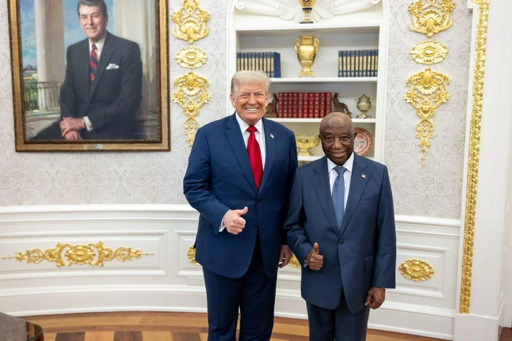 President Donald Trump greets President Joseph Nyuma Boakai of Liberia in the Oval Office, Wednesday, July 9, 2025, before a multilateral luncheon with African leaders. (US Embassy in Liberia)