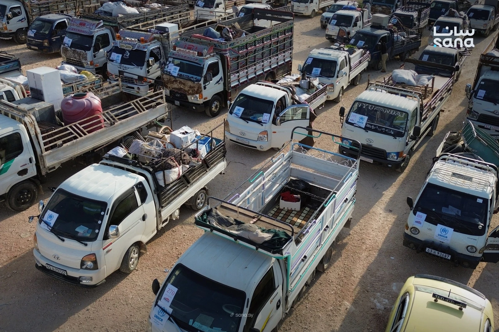 Hundreds of Syrian refugee families return home after years in camps