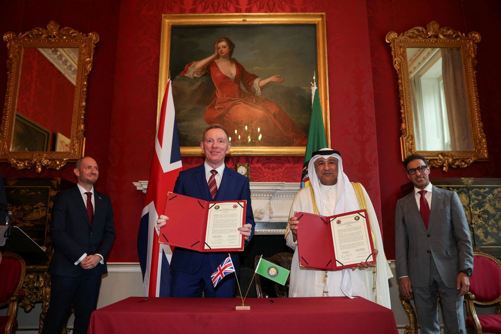 Britain Minister of State for Trade Chris Bryant and Jasem Mohamed Albudaiwi, secretary general of the Gulf Cooperation Council, pose after taking part in a signing ceremony at Downing Street in London, Britain, May 20, 2026. ADRIAN DENNIS/Pool via REUTERS
