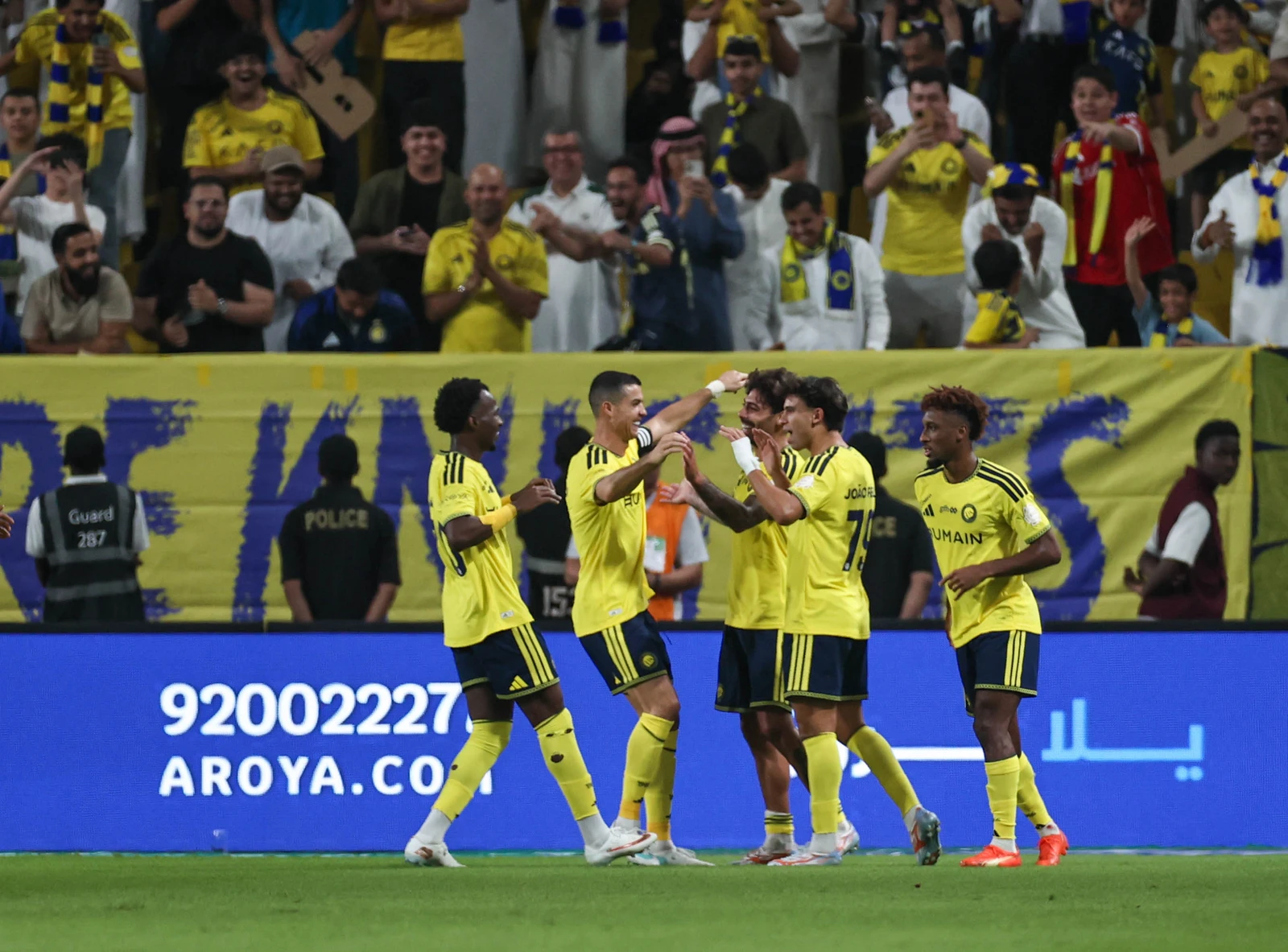 Samu Costa is surrounded by his teammates after netting Al-Nassr's second. (SPL)