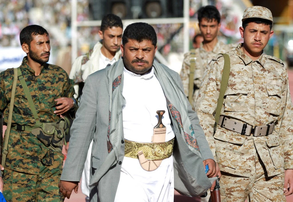 of the Shiite Huthi movement in a northern Sanaa stadium to watch on a giant screen a televised address by their chief Abdel Malek Al-Houthi on February 7, 2015. (AFP File)