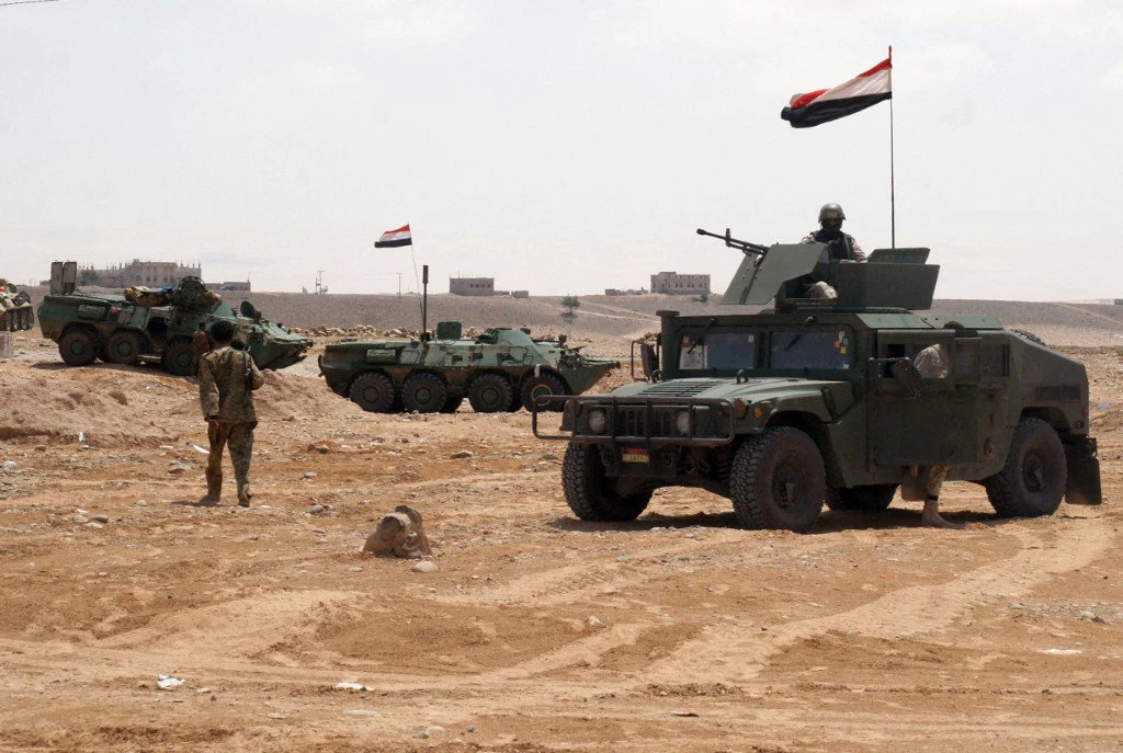 Yemeni military vehicles are positioned in the Maifaa region of Shabwa province during a major offensive against Al-Qaeda in the Arabian Peninsula (AQAP) on May 4, 2014. (AFP File)