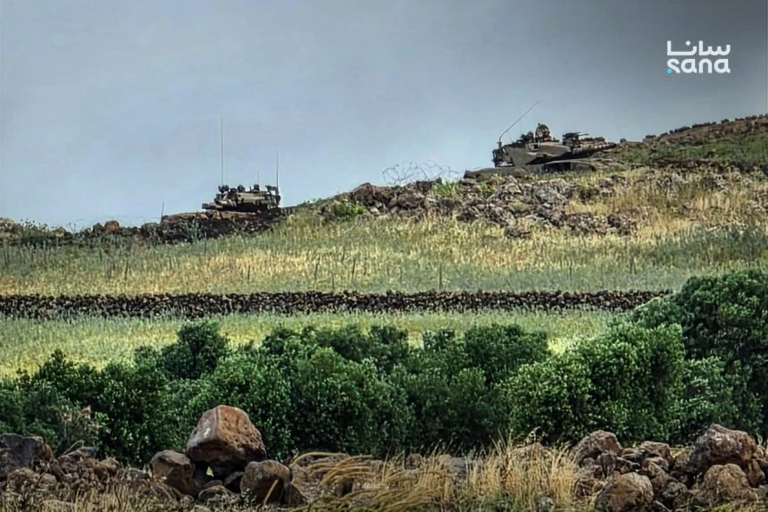 Israeli occupation forces deploy along a road during an incursion in southern Syria. (SANA/File photo)