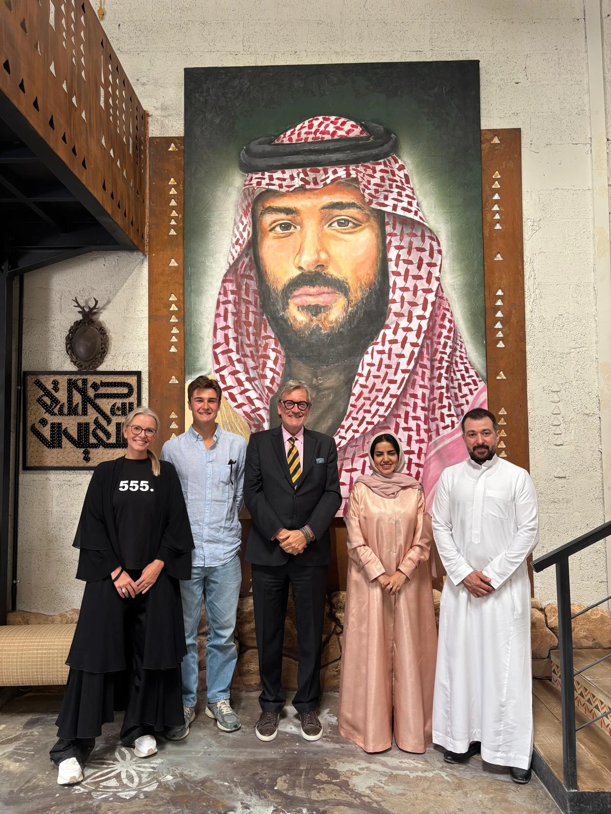 Van Pollaert at the studio of Saudi muralist Noura bin Saidan along with Belgian ambassador to KSA (Supplied by Cindy Van Pollaert)
