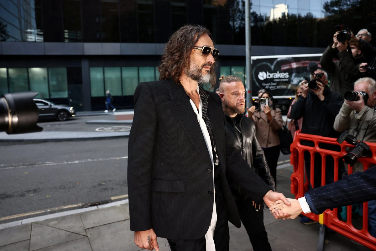 UK prosecutor labels Russell Brand a ruthless sexual predator as his sex assault trial begins