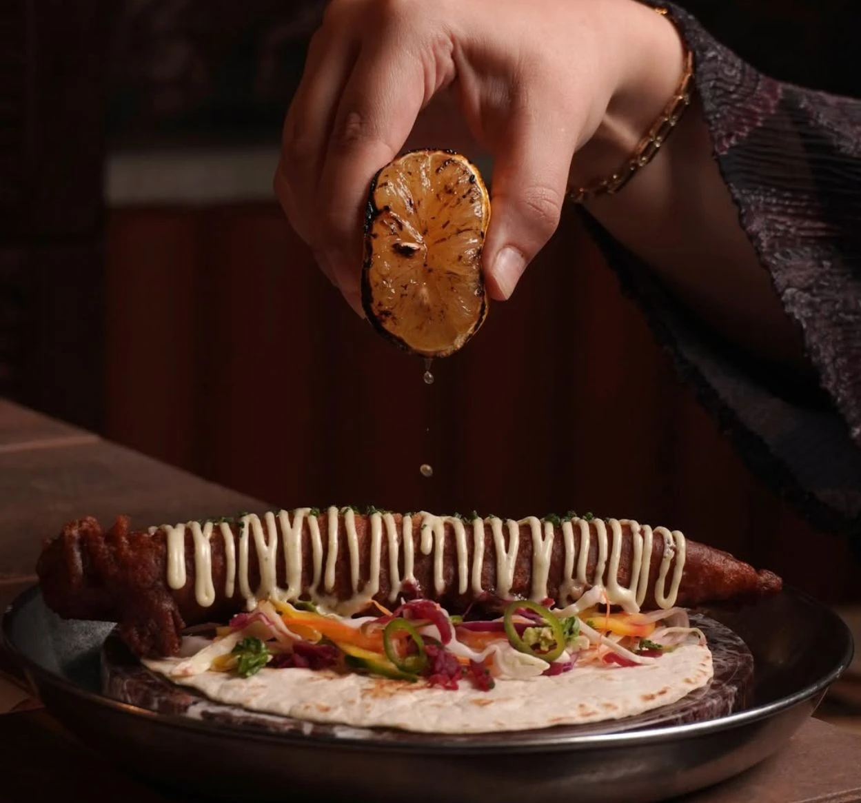 Ember Dining in Jeddah uses wood-fired cooking across a menu influenced by European, Asian and Mediterranean cuisines. (Supplied)