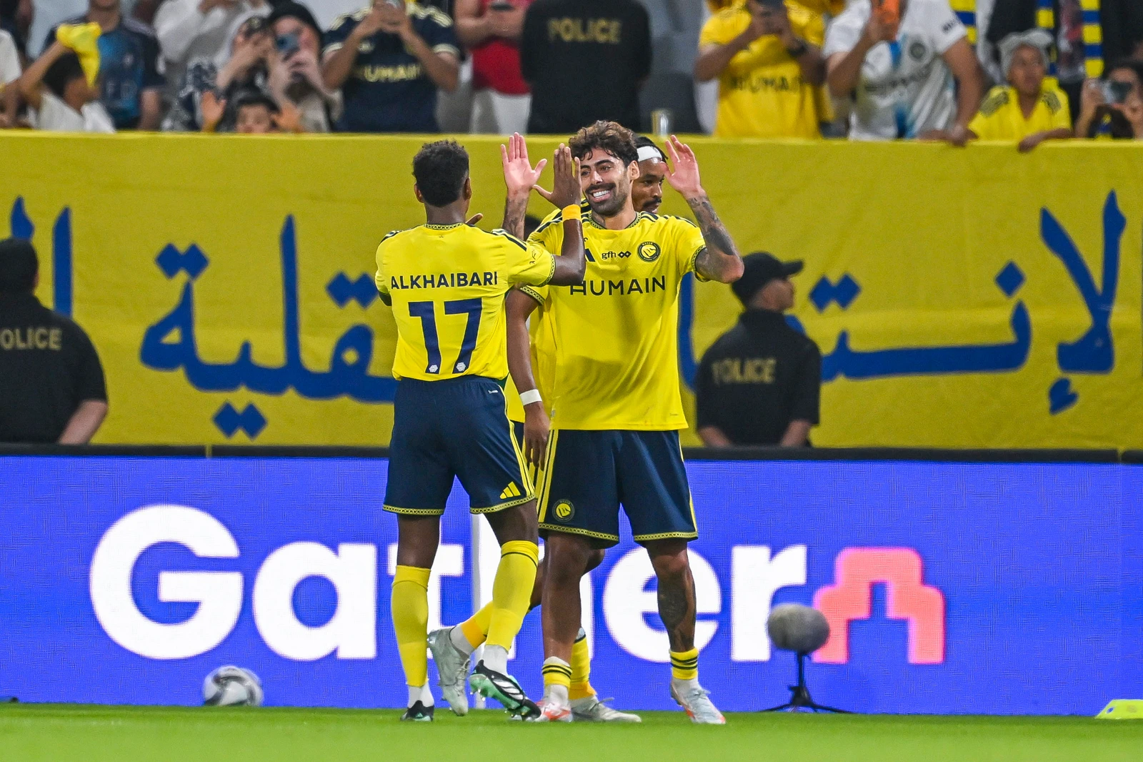 Abdullah Al-Khaibari and Samu Costa celebrate Al-Nassr's lead. (SPL)