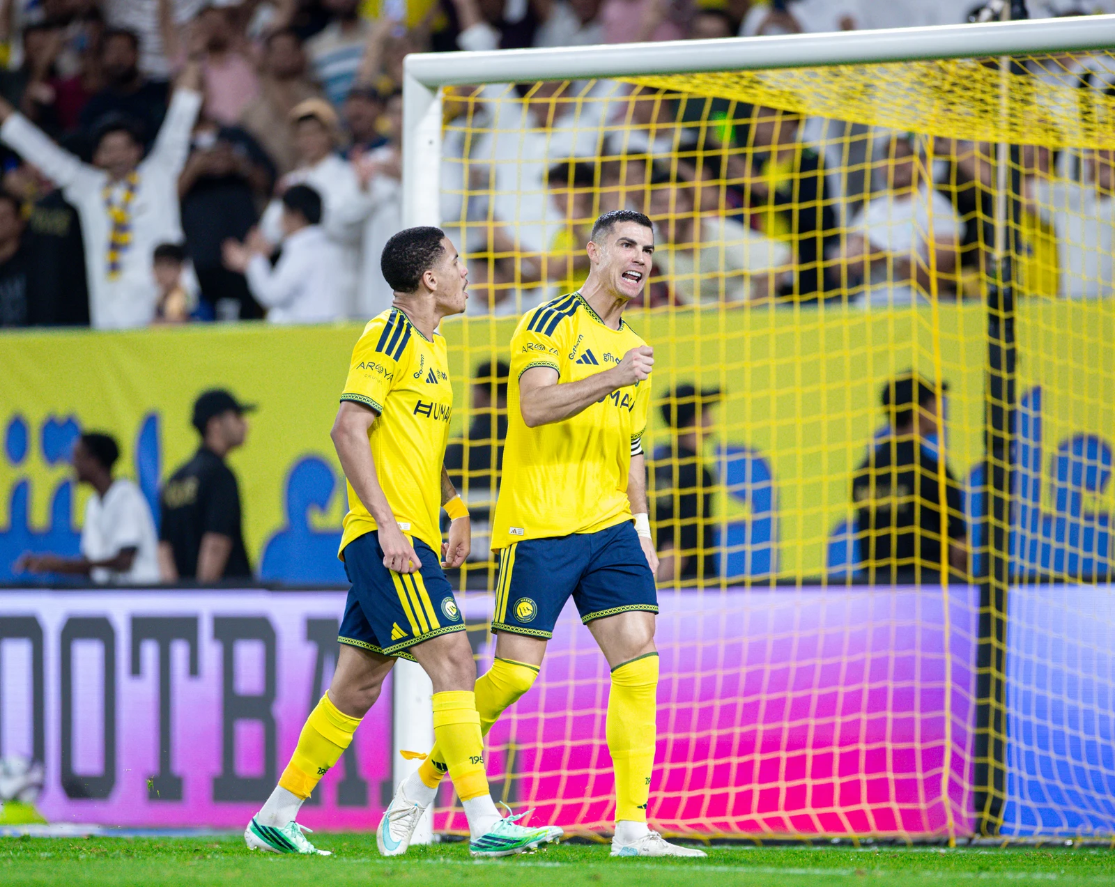 Cristiano Ronaldo celebrates his goal alongside teammate Angelo. (SPL)