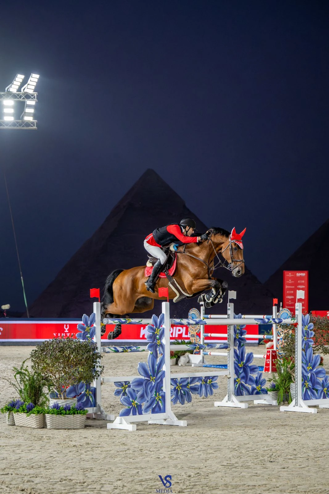 Lopez De La Osa Franco clears a fence under the floodlights in Cairo, where the Global Champions Tour staged its first event at the Pyramids of Giza. (VSMEDIA.EQUESTRIAN)