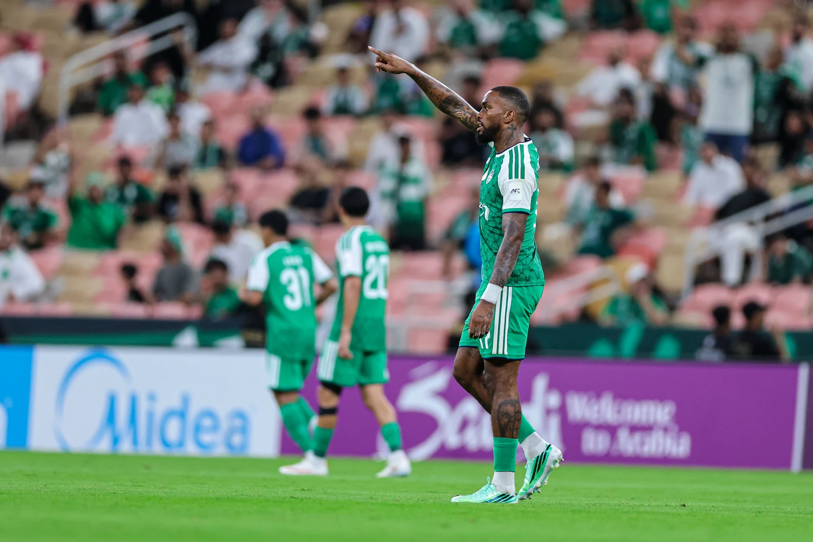 Al-Ahli's Ivan Toney celebrates opening the scoring against Al-Gharafa. (AFC)