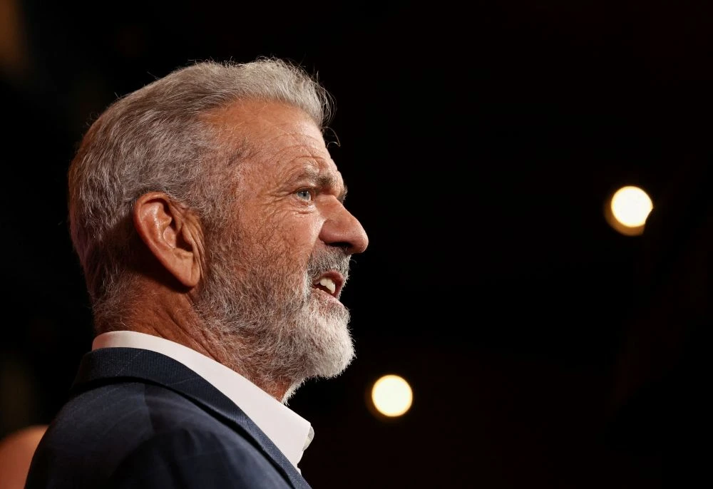 Justice Department lawyer who says she was fired in dispute over Mel Gibson’s gun rights sues