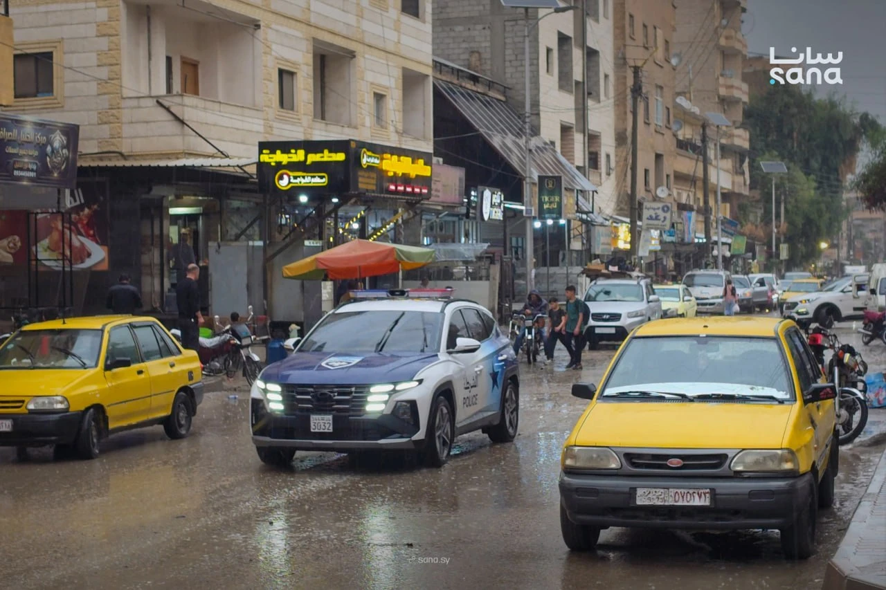 Syrian Civil Defense teams use a water-pumping truck to drain floodwater from a street following heavy rainfall in Syria, Oct. 28. (SANA)