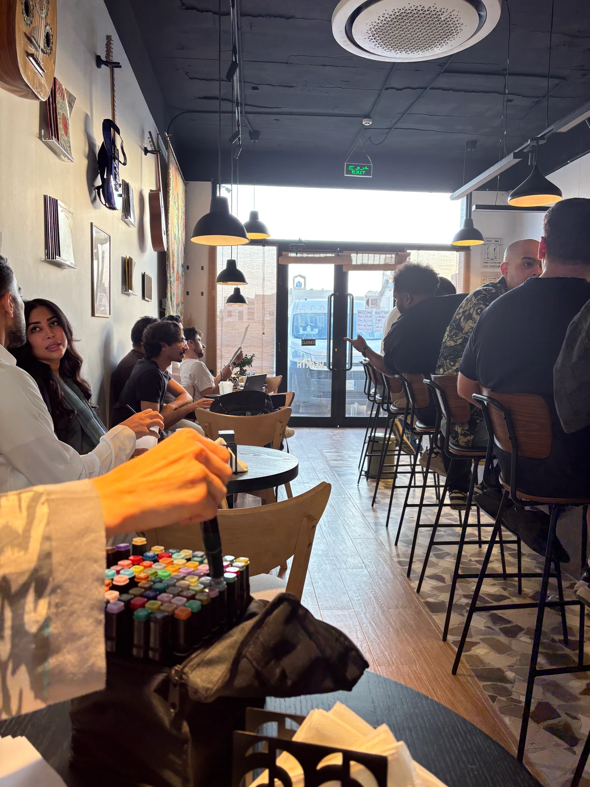 Part coffee and tea bar, part listening cafe, and fully fun, customers are invited to talk, flip through magazines or books together and fill in physical coloring books (AN photo)