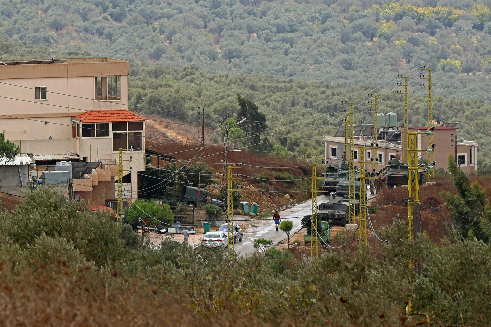 Israeli forces advance toward the outskirts of Deir Mimas as they reach an intersection near a newly established Lebanese army position. (AFP)